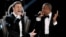 Recording artists Just Timberlake, left, and Jay-Z performing at the 55th annual Grammy Awards in Los Angeles, Feb. 10, 2013.