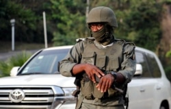A soldier stands guard on a street in Yaounde, Cameroon, Jan. 28, 2022.