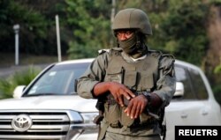 A soldier stands guard on a street in Yaounde, Cameroon, Jan. 28, 2022.