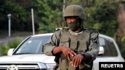 FILE - A soldier stands guard on a street in Yaounde, Cameroon, Jan. 28, 2022.