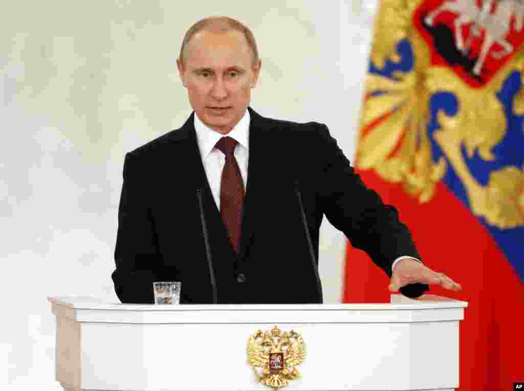 Russia&#39;s President Vladimir Putin addresses the Federation Council in Moscow&#39;s Kremlin, Russia, March 18, 2014.&nbsp;