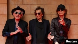 Rolling Stones band members Mick Jagger, Keith Richards and Ronnie Wood attend a launch event for their new album "Hackney Diamonds", at Hackney Empire in London, Britain, September 6, 2023. (REUTERS/Toby Melville)