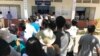 Cambodians line up to cast their votes at a local commune council elections at Kesararam Primary School polling station, Siem Reap, Cambodia Sunday June 4, 2017. (Thida Win/VOA Khmer)