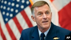 FILE - Coast Guard Commandant Admiral Paul Zukunft, pictured at the Coast Guard Academy in October 2015, says the Coast Guard could be the face of U.S. military presence in disputed waters without appearing too threatening.