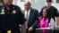 Bill Cosby arrives for his sexual assault trial with Keshia Knight Pulliam, right, at the Montgomery County Courthouse in Norristown, Pa., June 5, 2017.