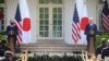 Japan's Prime Minister Yoshihide Suga and U.S. President Joe Biden hold a joint news conference in the Rose Garden at the White House in Washington, U.S., April 16, 2021. 