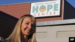 Denise Harle, an attorney with the conservative Christian law firm Alliance Defending Freedom, poses outside the Hope Center women's shelter in downtown, Anchorage, Alaska, Nov. 1, 2018.