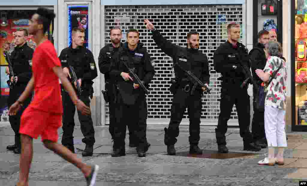 Police secures the area near Stachus square following shootings on July 22, 2016 in Munich.