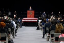 Dr. Jack Hawkins Jr., university chancellor, speaks behind the casket of the late John Lewis, during a service at Troy University, July 25, 2020, in Troy, Alabama.