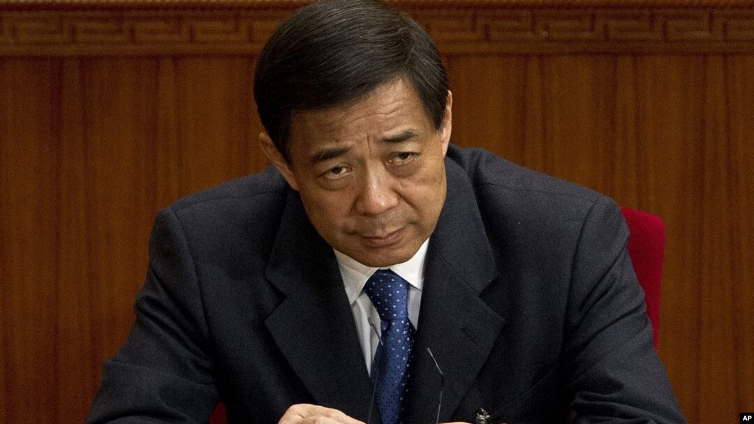 Then Chongqing party secretary Bo Xilai attends a plenary session of the National People's Congress at the Great Hall of the People in Beijing, March 11, 2012. 