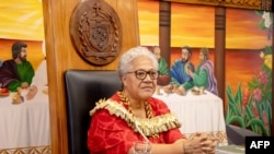 This picture released by the Samoa Observer on July 27, 2021 shows Samoa's new Prime Minister Fiame Naomi Mata'afa holding her cabinet's first meeting at the Government Building in Apia.