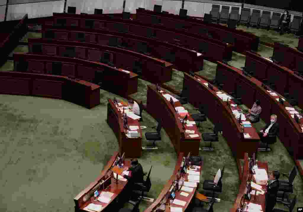 Empty seats of pro-democracy legislators are seen at Legislative Chamber in Hong Kong. Pro-democracy lawmakers announced they would resign en masse after four of them were ousted in a move one legislator said could sound the &ldquo;death knell&rdquo; for democracy there.&nbsp;