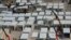FILE - An aerial view shows a construction site of a new makeshift COVID-19 hospital and isolation facilities in Tsing Yi of Hong Kong, on Feb. 26, 2022. 