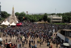 FILE - Protesters demand the resignation of Mali's President Ibrahim Boubacar Keita at Independence Square in Bamako, Mali, June 5, 2020.
