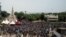 FILE - Supporters of the Imam Mahmoud Dicko and other opposition political parties attend a mass protest demanding the resignation of Mali's President Ibrahim Boubacar Keita at Independence Square in Bamako, Mali, June 5, 2020. 