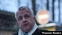 FILE PHOTO - U.S. ambassador to Russia John Sullivan speaks with journalists in Moscow.