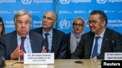 FILE - U.N. Secretary General, Antonio Guterres speaks while sitting next to WHO Director General Tedros Adhanom Ghebreyesus during an update on the situation regarding the COVID-19 at WHO headquarters in Geneva, Switzerland, February 24, 2020. (Salvatore