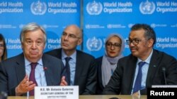 FILE - U.N. Secretary General, Antonio Guterres speaks while sitting next to WHO Director General Tedros Adhanom Ghebreyesus during an update on COVID-19 at WHO headquarters in Geneva, Switzerland, February 24, 2020. (Salvatore Di Nolfi/Pool via REUTERS)