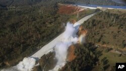 Feb 11 aerial photo released by the California Department of Water Resources shows the damaged spillway with eroded hillside in Oroville, Calif. 