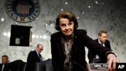 FILE - Senate Judiciary Committee ranking member Sen. Dianne Feinstein, D-California, arrives for a hearing of the committee, on Capitol Hill in Washington, Dec. 6, 2017.