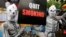 Activists dressed as skeletons participate in an awareness campaign on World No Tobacco Day in Kolkata, india, May 31, 2014.
