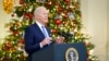 President Joe Biden speaks about the COVID-19 response and vaccinations, in the State Dining Room of the White House in Washington, Dec. 21, 2021.