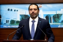 In this photo released by Lebanon's official government photographer Dalati Nohra, Lebanese Prime Minister Saad Hariri, speaks after a cabinet meeting, at the presidential palace, in Baabda, east of Beirut, Lebanon, Oct. 21, 2019.