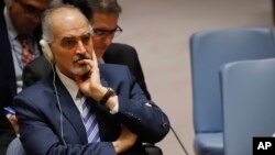 United Nations Ambassador from Syria Bashar Ja'afari listens during a meeting of the U.N. Security Council, April 9, 2018, at U.N. headquarters. 