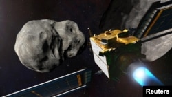 Illustration of NASA's DART spacecraft prior to impact at the Didymos binary asteroid system