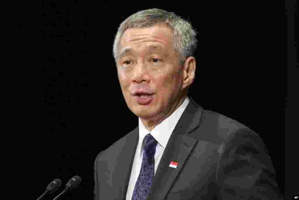 Perdana Menteri Singapura Lee Hsien Loong, putra Lee Kuan Yew, dalam sebuah acara di Tokyo, 2014.&nbsp;​(AP/Koji Sasahara)