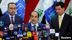 Riyadh al-Badran, the head of Iraq's Independent High Electoral Commission, speaks during a news conference on the results of the election in Baghdad, May 19, 2018.