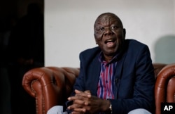 FILE - Zimbabwe opposition leader Morgan Tsvangirai speaks to the Associated Press after giving a press conference at his home in Harare, Zimbabwe, Nov. 16, 2017.