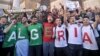 Algerians march during a protest in Algiers, Algeria, March 15, 2019.