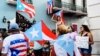 En San Juan, capital de la isla, miles de manifestantes también marcharon este lunes a la residencia del gobernador por tercer día para exigir su renuncia de Ricardo Rosselló.
