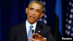 U.S. President Barack Obama speaks at a joint news conference with Estonian counterpart Toomas Hendrik Ilves at the Bank of Estonia in Tallinn, Sept. 3, 2014. 