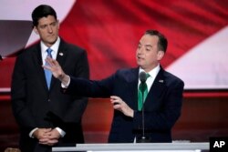 House Speaker Paul Ryan of Wisconsin, listens as Reince Priebus, Chairman of the Republican National Committee, explains the convention rules for casting votes after Alaska delegation refused to follow Ryan's order to record the nomination vote. (AP)
