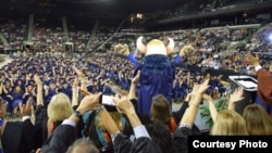 Students and their families celebrate graduation at Del Mar College in Corpus Christi, Texas.