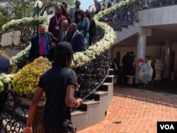 People at the Blue Roof in Harare