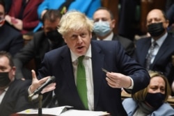 British Prime Minister Boris Johnson speaks during the weekly question time debate at Parliament in London, Britain, Jan. 19, 2022.
