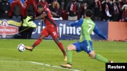 Un match de MLS opposant le Toronto FC aux Seattle Sounders.