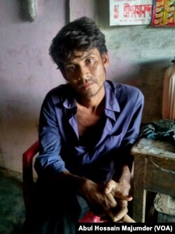 Hanif Khan, seemingly depressed, sits at his Kashipur village home in Cachar district of Assam a few days before he committed suicide on Jan. 1, 2018. He hanged himself hours after he found his name missing from the previous draft of NRC, published on Jan