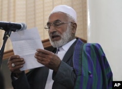 The father of Farkhunda speaks at a hearing at the Primary Court in Kabul, Afghanistan, Wednesday, May 6, 2015.