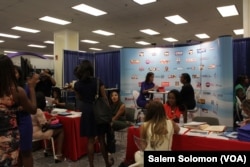 Attendees network at the National Association of Black Journalists and the National Association of Hispanic Journalists in Washington, Aug. 3, 2016.