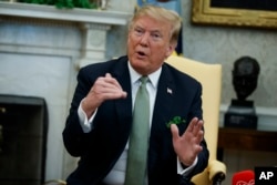 President Donald Trump speaks during a meeting with Irish Prime Minister Leo Varadkar in the Oval Office of the White House, March 14, 2019.