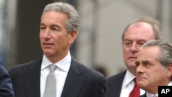FILE - Charles Kushner, left, walks to the U.S. District Courthouse with his lawyers Benjamin Brafman, right, and Alfred C. DeCotiis, center, in Newark, N.J., Aug. 18, 2004. Charles Kushner runs Kushner Cos.