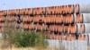 FILE - Unused pipes for the Nord Stream 2 gas pipeline under the Baltic Sea are seen in the harbor of Mukran, Germany, on Sept. 30, 2022. 