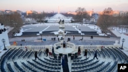 FILE - Members of the U.S. military are on stage during a rehearsal at the U.S. Capitol ahead of President-elect Donald Trump's upcoming inauguration in Washington, Jan. 12, 2025.