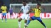 FILE: Ghana's forward Jordan Ayew (L) fights for the ball with Gabon's defender Johann Obiang during the Group C Africa Cup of Nations (CAN) 2021 football match between Gabon and Ghana at Stade Ahmadou Ahidjo in Yaounde. Taken 1.14.2022