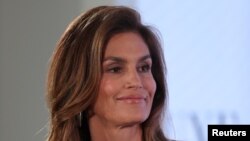 FILE - Cindy Crawford speaks at the Wall Street Journal Digital conference in Laguna Beach, California, U.S. Oct. 18, 2017. 