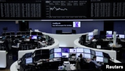 The German share price index, DAX board, is seen at the stock exchange in Frankfurt, Germany, Feb. 14, 2018. 